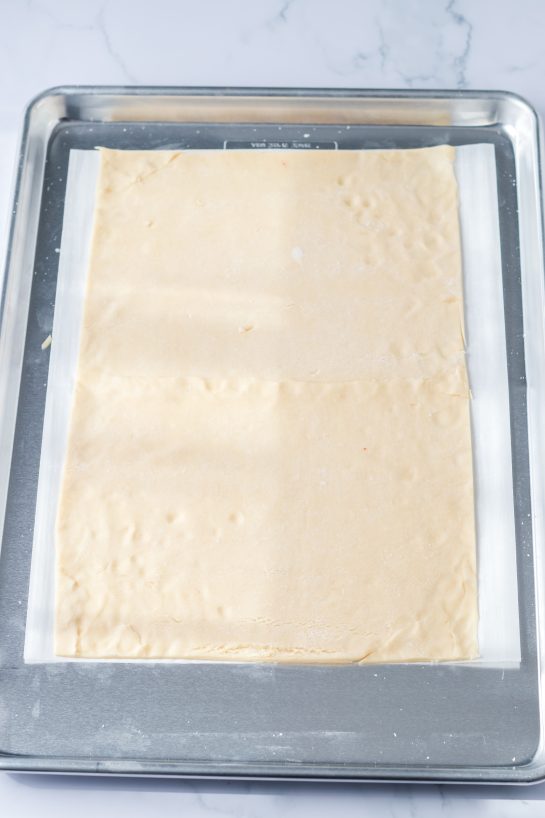 Spreading out the dough for the sheet pan strawberry poptarts recipe