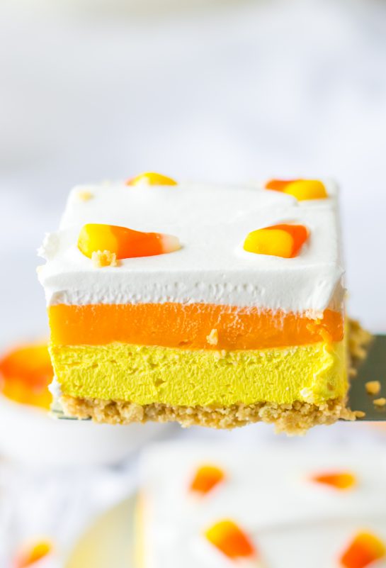 Layers of vanilla cookies, a creamy cheesecake layer and a vanilla pudding layer all colored to look like candy corn. Candy Corn Lush recipe is always a favorite at fall parties and is a make-ahead Halloween dessert that’ll make all ghouls go wild!