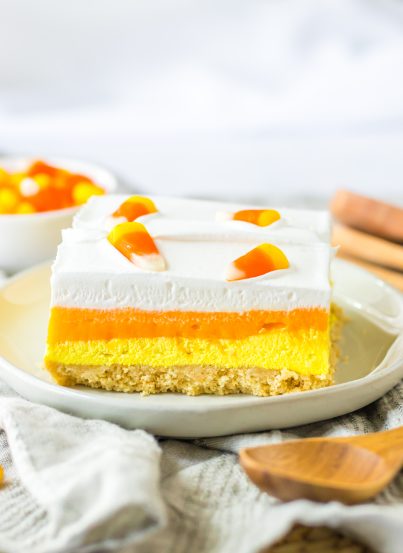 Layers of vanilla cookies, a creamy cheesecake layer and a vanilla pudding layer all colored to look like candy corn. Candy Corn Lush recipe is always a favorite at parties and is a make-ahead fall Halloween dessert that’ll make all ghouls go wild!