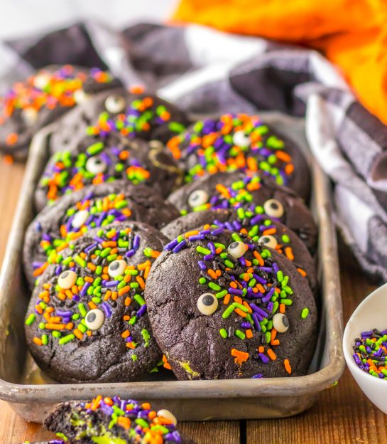 Easy Stuffed Black Velvet Cookies are perfect for Halloween dessert recipe.  Dark chocolate cookies are stuffed with a creamy, green cheesecake filling that is so tasty.  Halloween sprinkles top off these spooky cookies that kids and adults will love.
