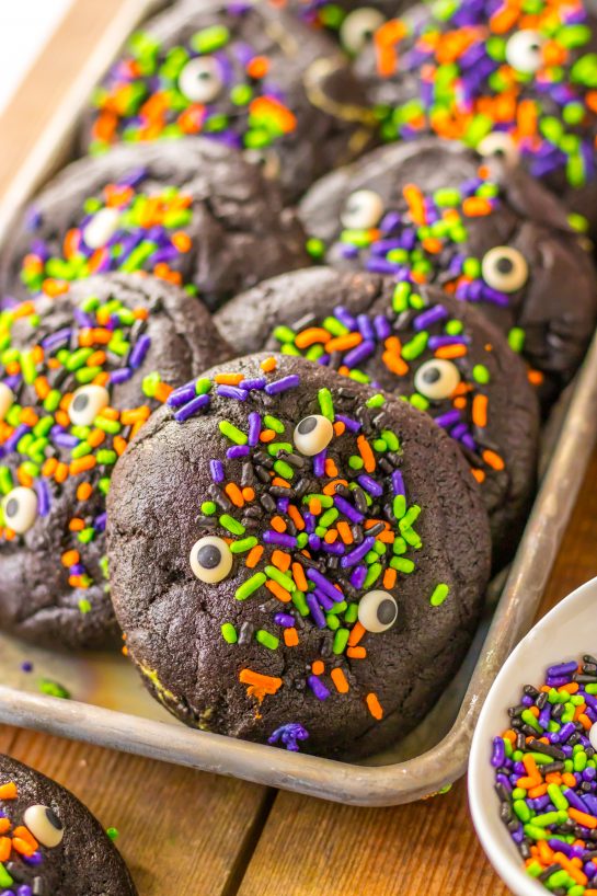 Easy Stuffed Black Velvet Cookies are perfect for Halloween dessert recipe.  Dark chocolate cookies are stuffed with a creamy, green cheesecake filling that is so delicious.  Halloween sprinkles top off these spooky cookies that kids and adults will love.