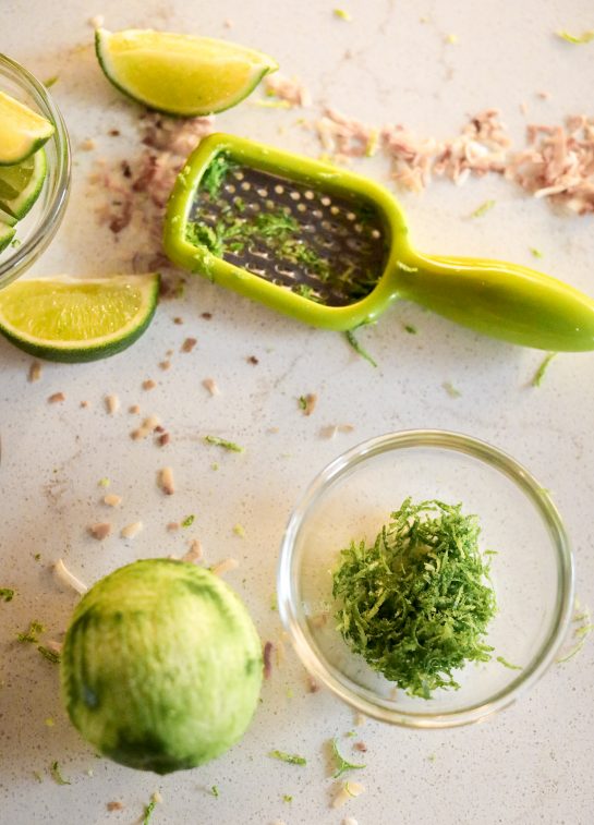 Zesting the lime to make the Coconut Lime Frozen Margaritas recipe