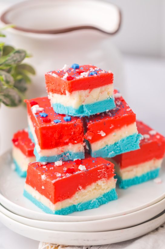 Red, White and Blue Fudge recipe is the perfect patriotic treat to make for Memorial Day, 4th of July, Flag Day, Labor Day, or summer BBQ. With its festive red, white, and blue colors, you can impress anybody! A no-bake treat for summer with just a few simple ingredients!