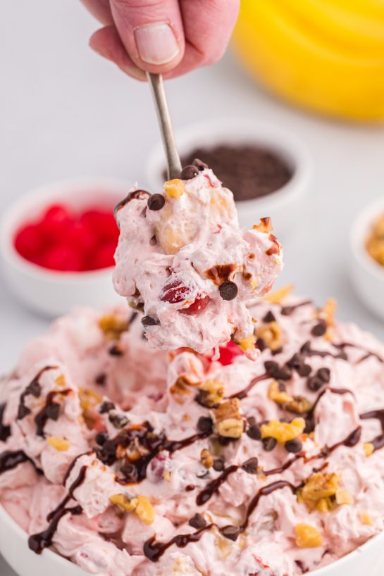 Close-up of the Banana Split Fluff Salad Recipe being scooped out