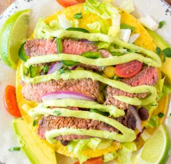 Steak Tostada Salad recipe has a Mexican twist and is the steak salad of your dreams! It's loaded with a juicy steak, your favorite veggies, and a creamy cilantro-lime vinaigrette. It makes a delicious healthy lunch or dinner salad!