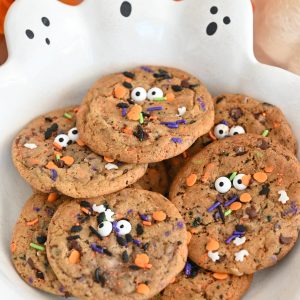 Halloween Monster Chocolate Chip Cookies recipe: the perfect blend of crisp edges and chewy centers, bursting with rich buttery flavor and gooey chocolate chips. Topped with playful candy eyes and a sprinkle of festive colors, they’re not just a treat—they’re a fun and spooky addition to any Halloween celebration.