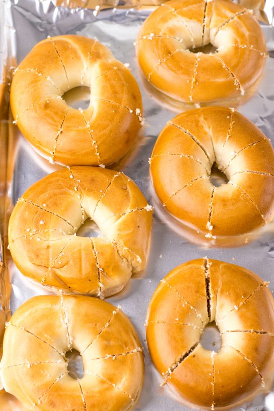 Photo of Tik Tok Stuffed Bagels sliced and ready to be stuffed with the cream cheese filling.