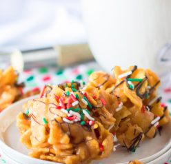 Frito Candy recipe is a creamy, gooey base of peanut butter candy gets tossed with salty Fritos for a fabulous treat for Christmas.  You will drizzle them with chocolate and top them with sprinkles and they are perfect for a holiday dessert tray or gifting.