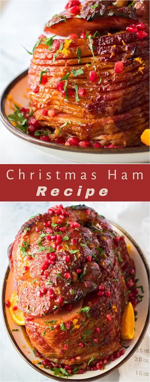 Gorgeous, glazed Christmas ham recipe: this one is perfect!  Orange juice, brown sugar, honey and cinnamon make up a delicious glaze for this ham.  Orange zest, pomegranate seeds and parsley give this ham it’s festive colors.  This ham smells and tastes like Christmas Day and is sure to become your new holiday ham.