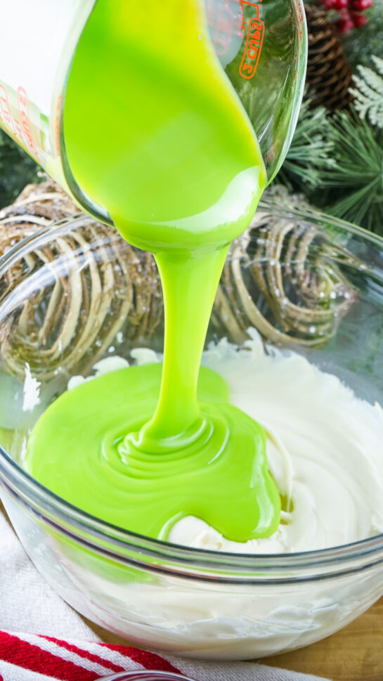 Pouring the mixture ready to be made into Grinch Fudge recipe