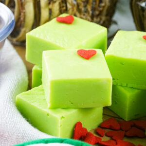 This Grinch Fudge recipe combines white chocolate, sweetened condensed milk, and green food coloring to create a creamy, no-bake Christmas fudge. Perfect for holiday parties, kids’ treats, cookie exchanges, and festive dessert trays!