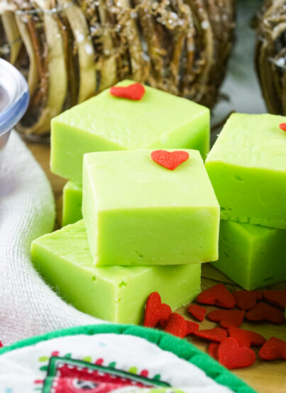 This Grinch Fudge recipe combines white chocolate, sweetened condensed milk, and green food coloring to create a creamy, no-bake Christmas fudge. Perfect for holiday parties, kids’ treats, cookie exchanges, and festive dessert trays!